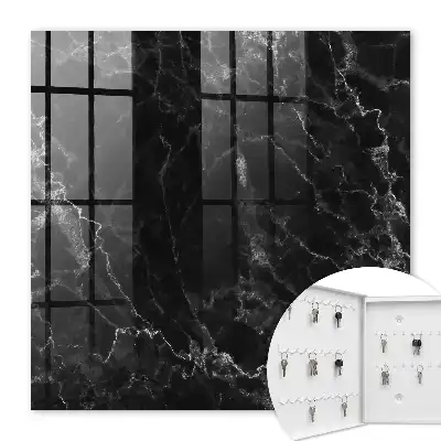 Key cabinet with a black and white marble pattern