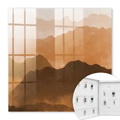 Wall mounted key cabinet Mountain panorama in shades of orange