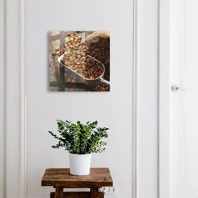 Key cabinet Coffee beans in a metal ladle