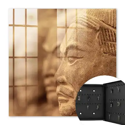 Wall mounted key cabinet Historical sculpture of clear details
