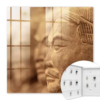 Wall mounted key cabinet Historical sculpture of clear details