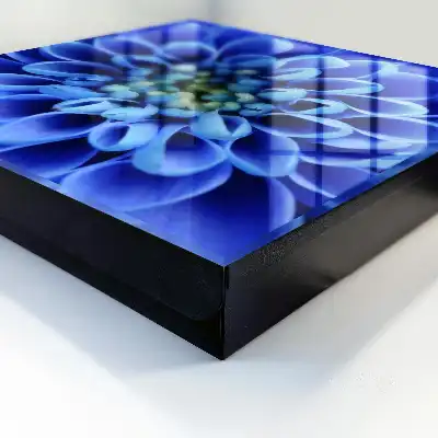 Wall mounted key box A blue flower spirals