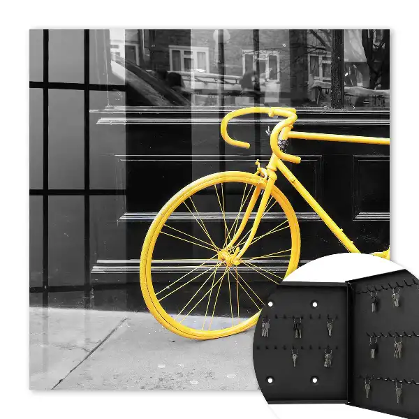 Key box for home A yellow bike in a black and white background