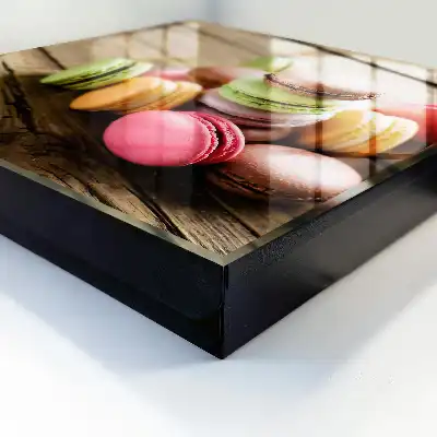 Decorative key box Colorful sweets on a wooden background
