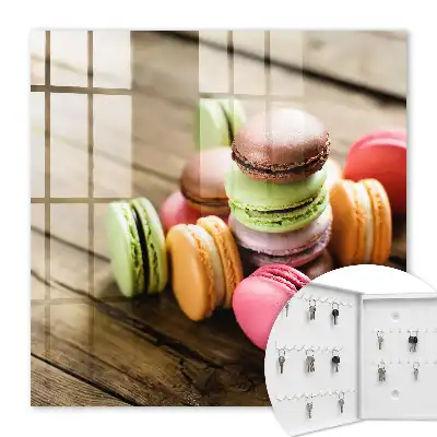 Decorative key box Colorful sweets on a wooden background
