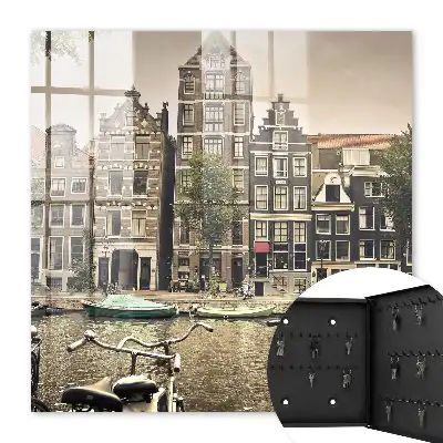 Wall mounted key cabinet Urban peace and quiet in the bicycle canal