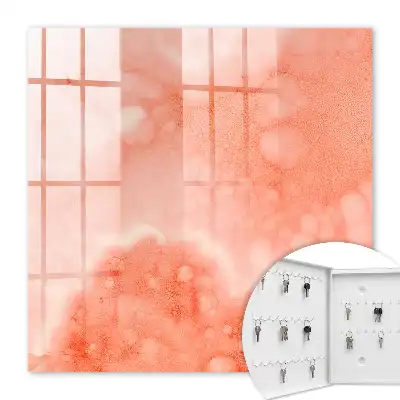 Wall mounted key cabinet Orange abstraction in the background