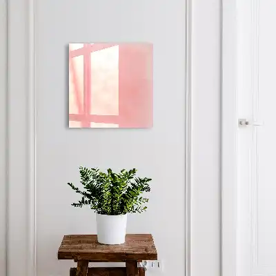 Wall mounted key cabinet Pink background with a subtle pattern