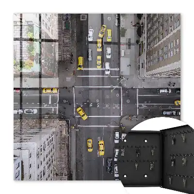 Wall mounted key box City streets full of taxis