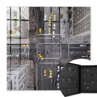 Wall mounted key box City streets full of taxis