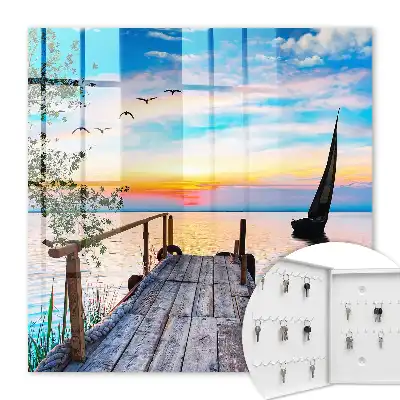 Wall mounted key box Peaceful lake landscape with a sailboat