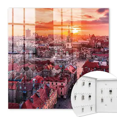 Wall mounted key box Sunset over historic rooftops