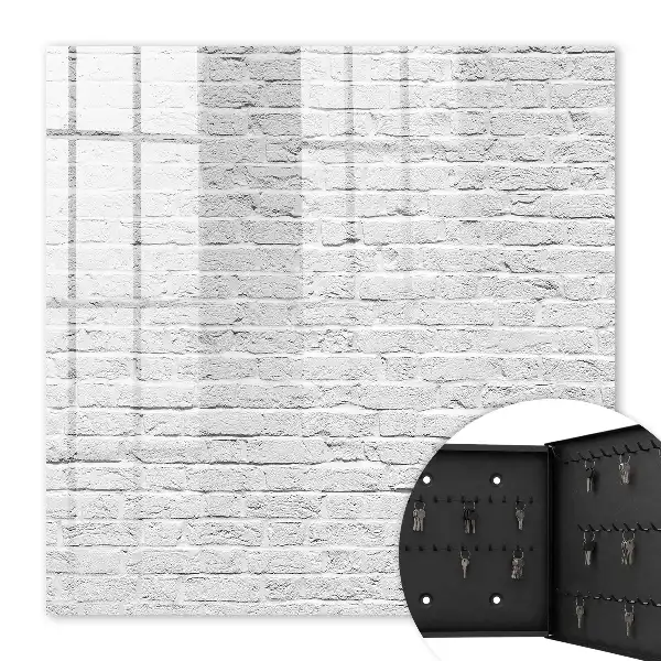 Wall mounted key cabinet Brick wall with a rough texture