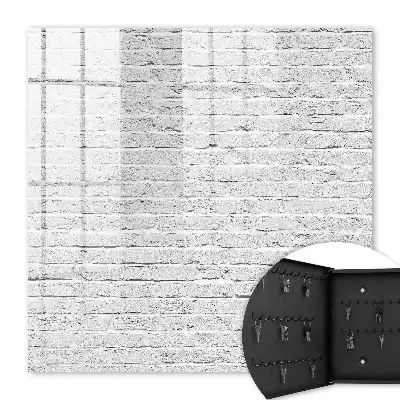 Wall mounted key cabinet Brick wall with a rough texture
