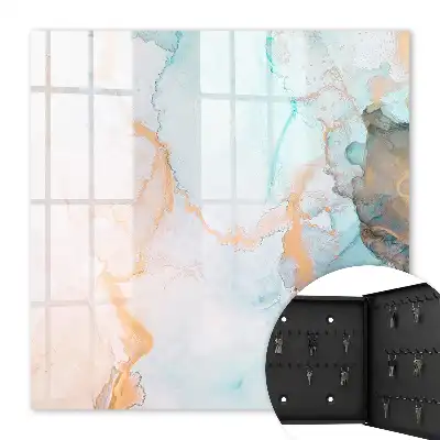 Wall mounted key cabinet with colorful orange marble pattern