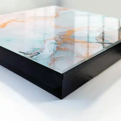 Wall mounted key cabinet with colorful orange marble pattern