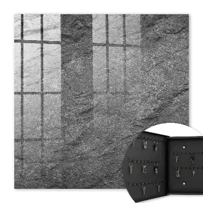 Wall mounted key cabinet in gray stone