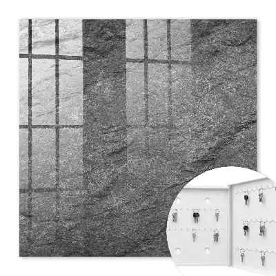 Wall mounted key cabinet in gray stone