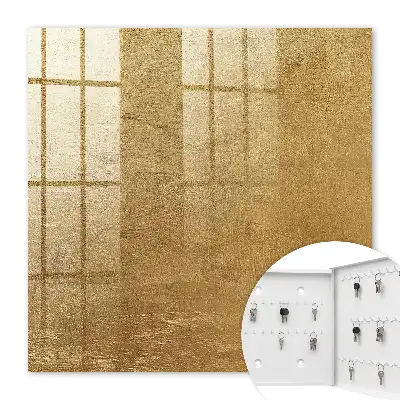 Decorative key box with warm textured light streaks