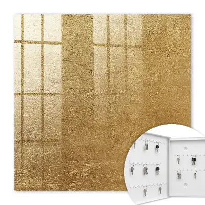 Decorative key box with warm textured light streaks