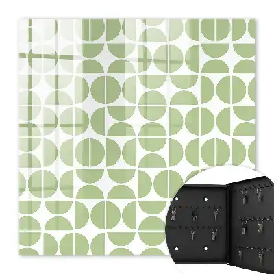 Wall mounted key cabinet Green geometry on white background