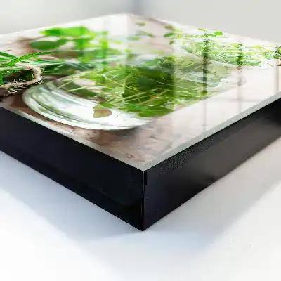 Wall mounted key box Green herbs in a wooden vessel