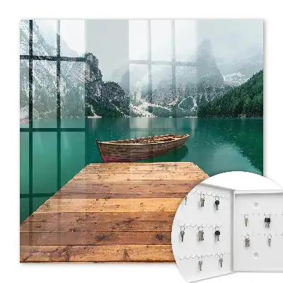 Wall mounted key box A mountain lake surrounded by peaks