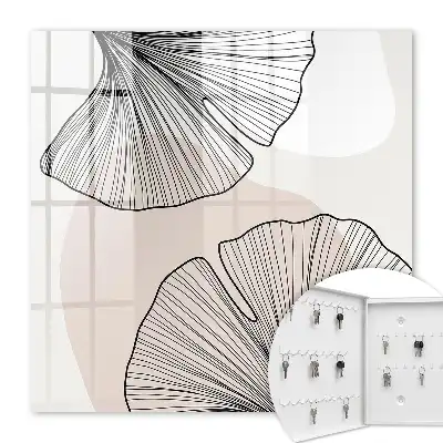 Wall mounted key box Black leaves on a cream background