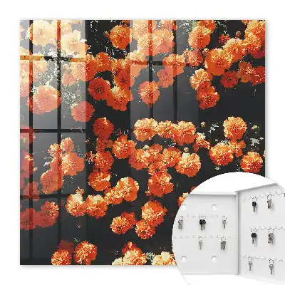 Wall mounted key cabinet Blooming abundance in the dark background