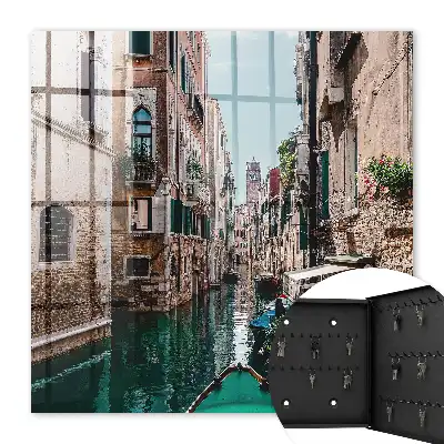 Key box for home Venice canal with historic buildings