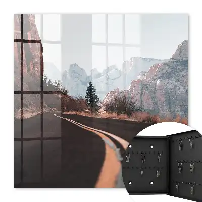 Wall mounted key box Road in the mountains, blue sky