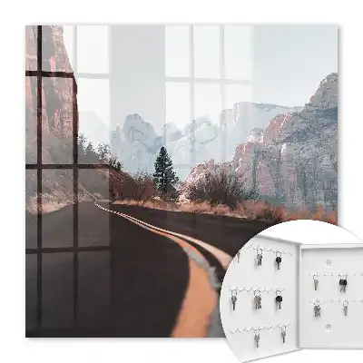 Wall mounted key box Road in the mountains, blue sky