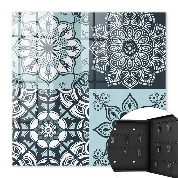 Wall mounted key cabinet Geometric patterns in cool tones