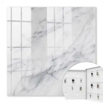 Wall mounted key cabinet Marble elegance with a white background