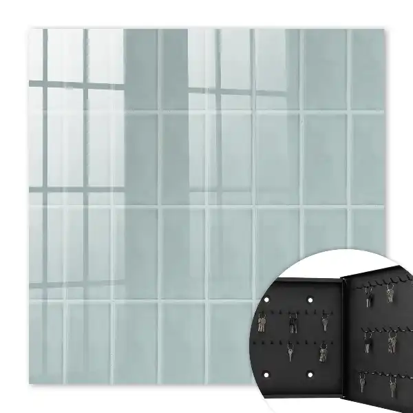 Wall mounted key cabinet Blue tiles in muted tones