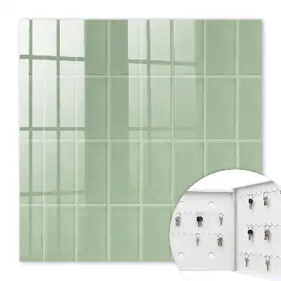Wall mounted key box Green tiles in a symmetrical arrangement