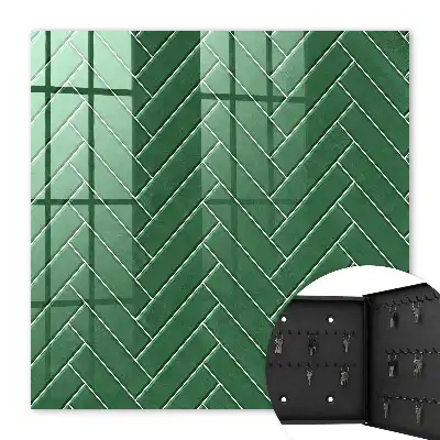 Wall mounted key cabinet The green herringbone of a space of elegance