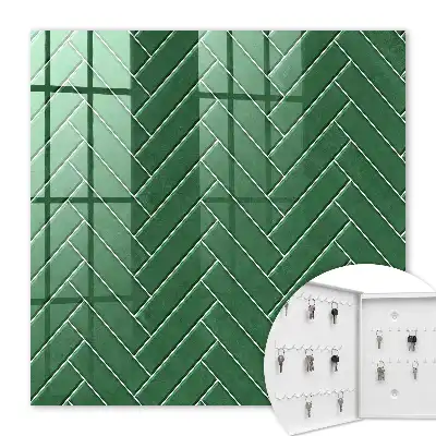 Wall mounted key cabinet The green herringbone of a space of elegance