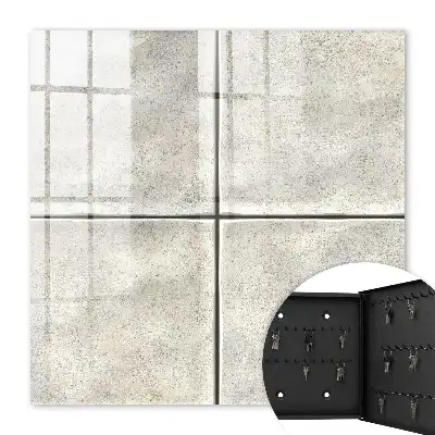 Wall mounted key cabinet with subtle beige tile design