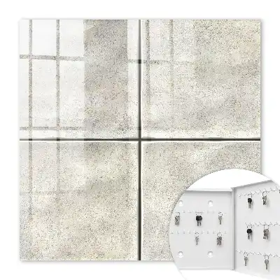 Wall mounted key cabinet with subtle beige tile design