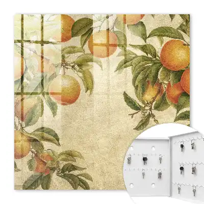 Wall mounted key box Oranges in the bright nature background