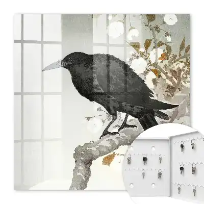 Wall mounted key cabinet with black raven on a branch with flowers design