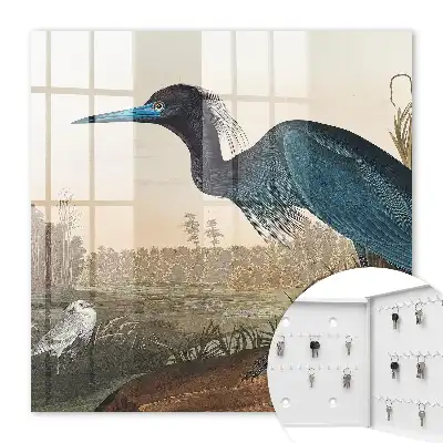 Wall mounted key box featuring an exotic bird among lush vegetation