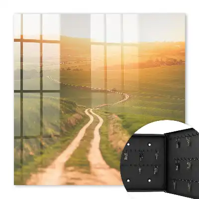 Wall mounted key cabinet A picturesque landscape with green fields