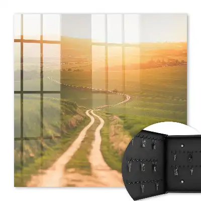 Wall mounted key cabinet A picturesque landscape with green fields