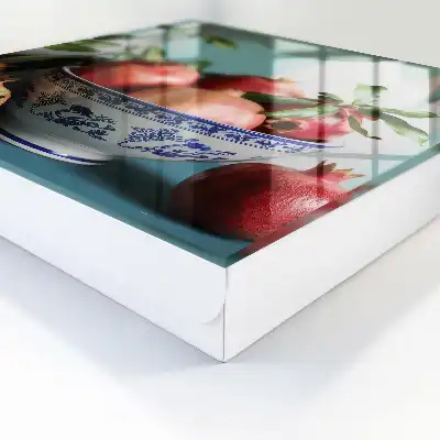 Decorative key box Navy blue fruit against a green background