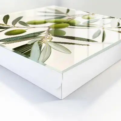 Wall mounted key cabinet A branch with olives in the cream background