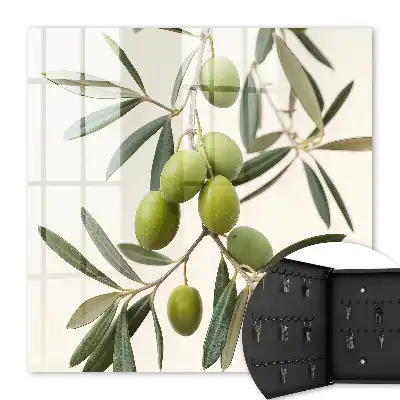 Wall mounted key cabinet A branch with olives in the cream background