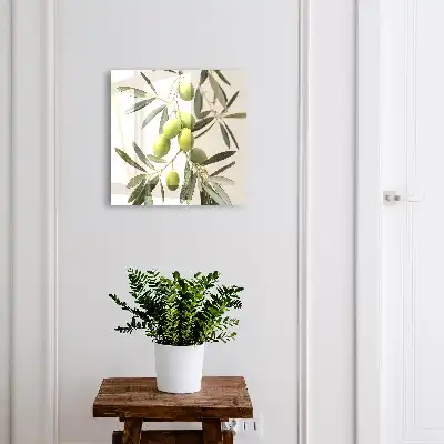 Wall mounted key cabinet A branch with olives in the cream background