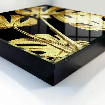 Key cabinet Monstera leaves in black background